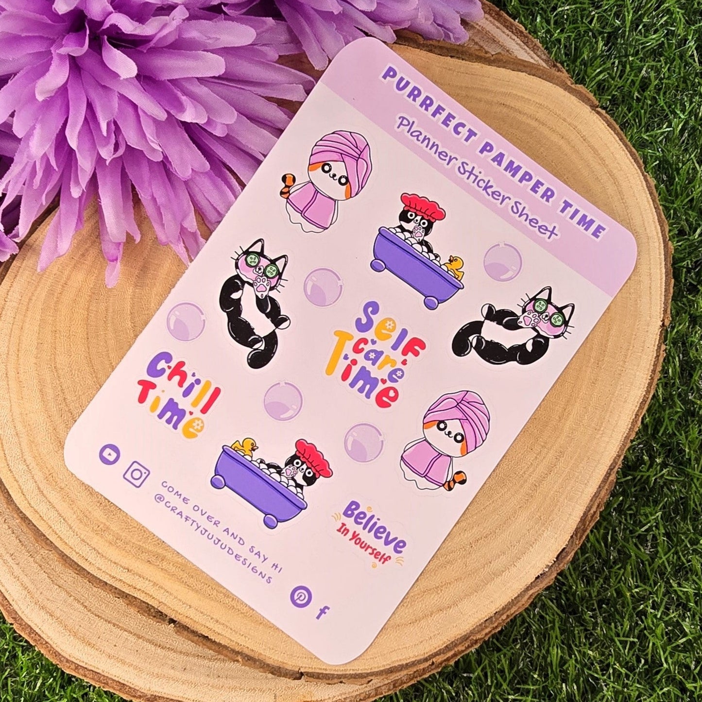 Sticker sheet with cartoon characters on a wooden surface with purple flowers in the background