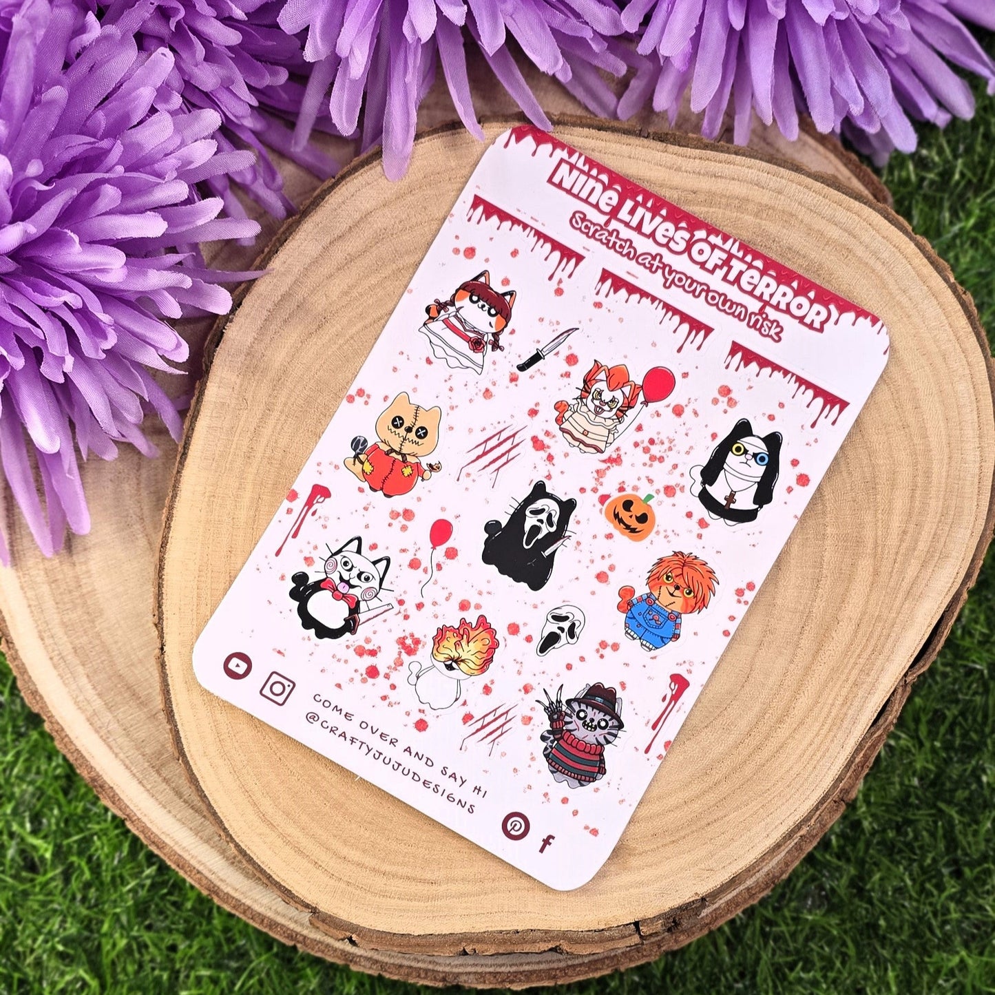 Sticker sheet with cartoon characters on a wooden surface with purple flowers in the background