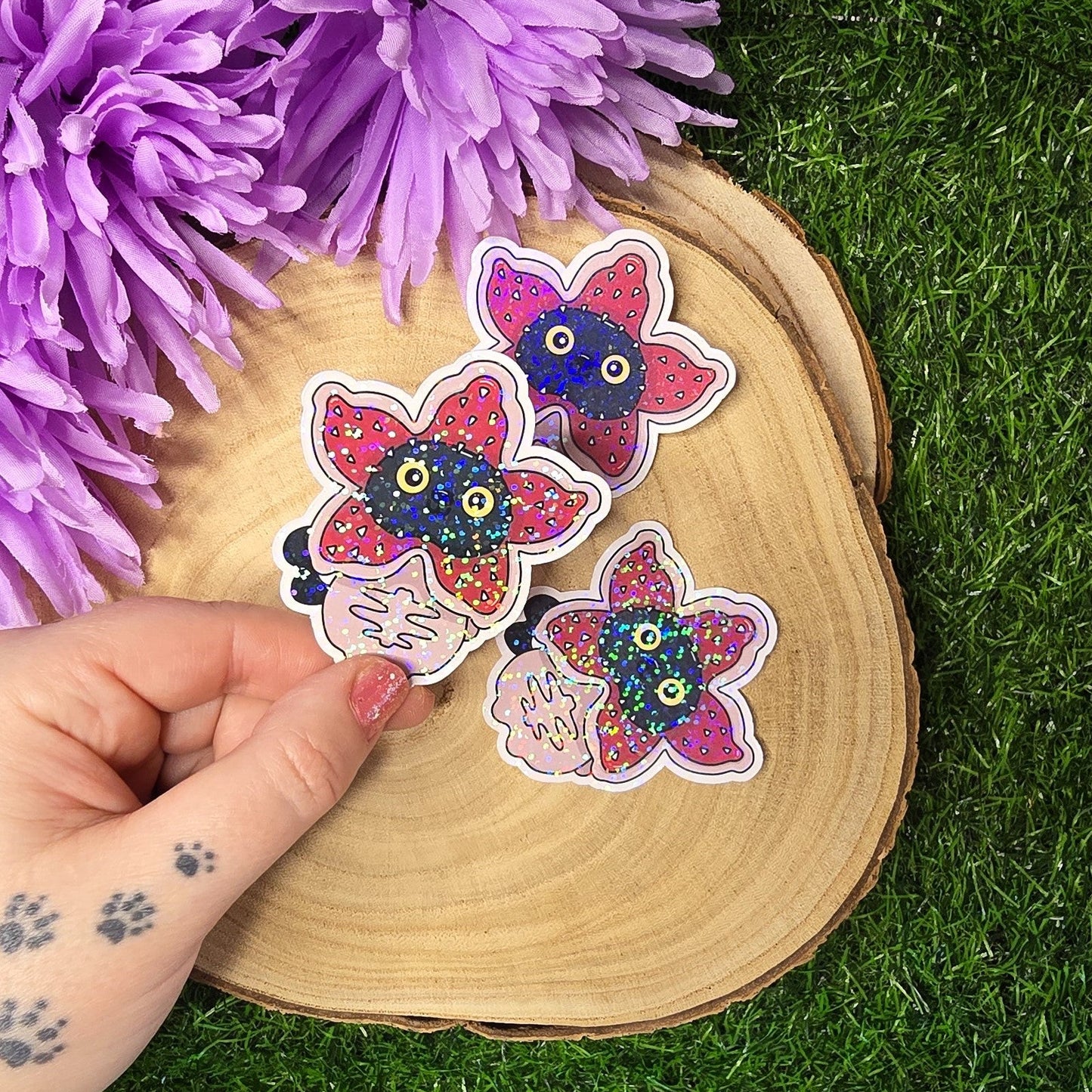 Holographic Luna black cat dressed as spooky flower monster, 80s horror inspired die cut waterproof sticker 7cm UK