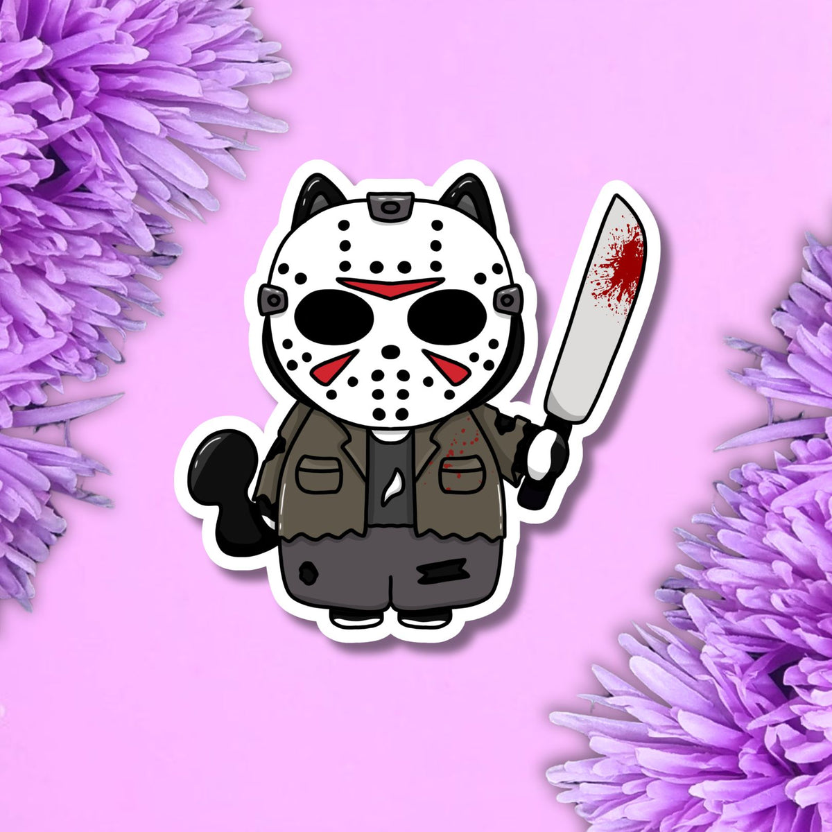 A die-cut vinyl sticker featuring a chibi-style character resembling Jason Voorhees, wearing a white hockey mask with red markings, a brown jacket, and gray pants, while holding a silver knife with red blood splatters. The sticker is displayed on a light pink background framed by purple flowers.