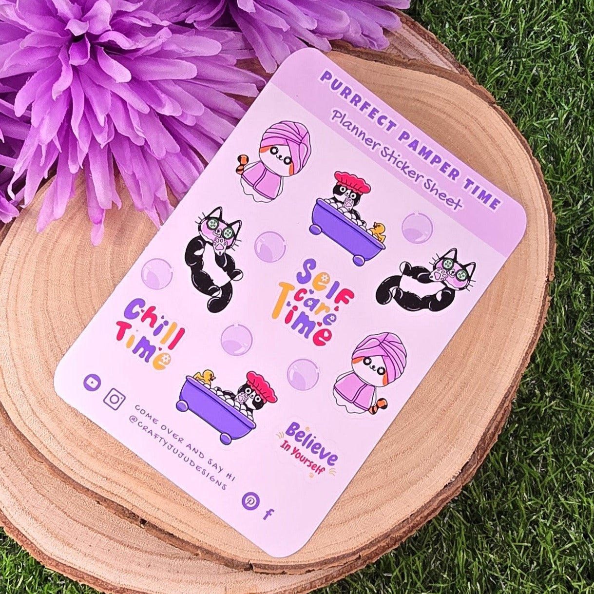 Sticker sheet with cartoon characters on a wooden surface with purple flowers in the background