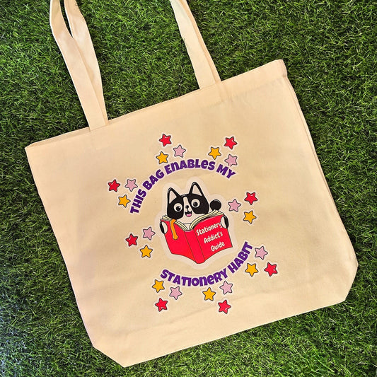 This Bag Enables My Stationery Habit – Cream Cotton Tote Bag with Cat & Book Illustration | DTF Print Eco Shopper for Stationery Addicts