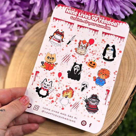 Sticker sheet with cartoon characters on a wooden surface with purple flowers in the background