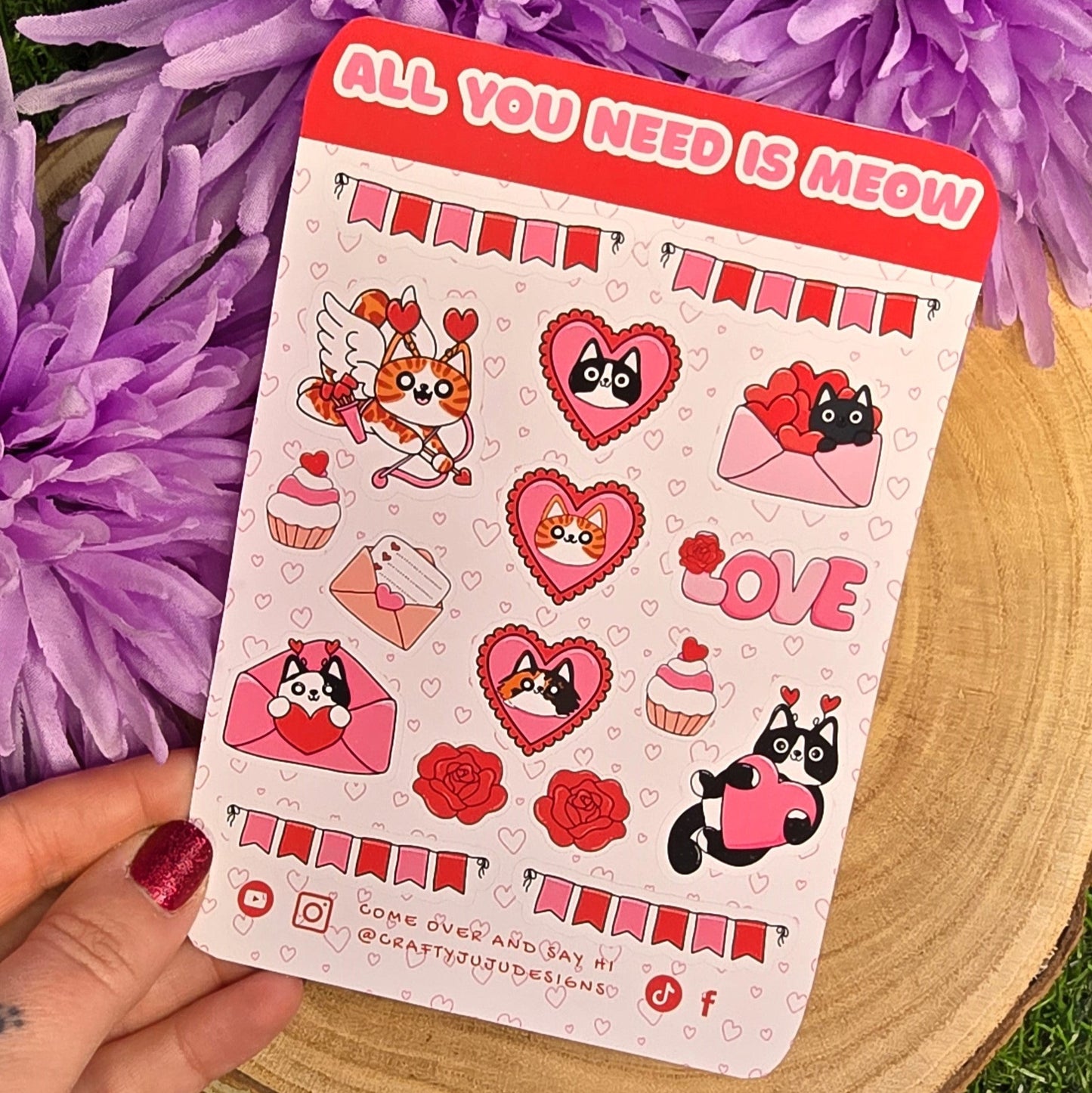 cat stickers featuring cats and text 'All You Need is Meow' on a purple flower background.