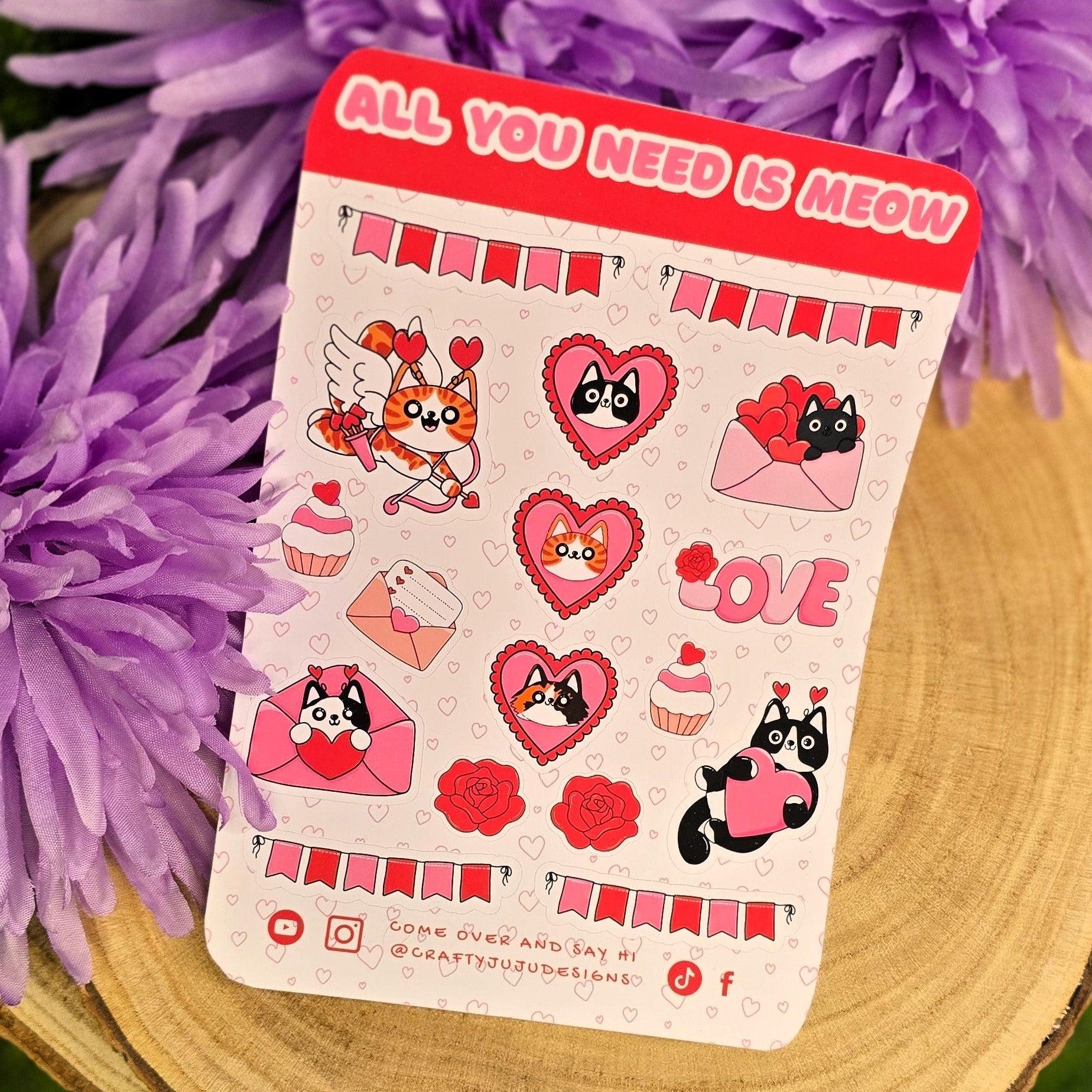 cat sticker characters and text 'All You Need is Meow' surrounded by purple flowers.