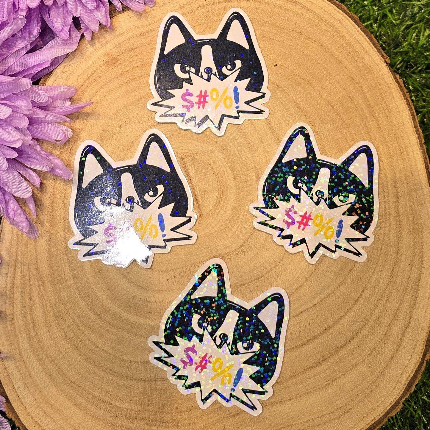Holographic angry cat sticker with censored swear bubble