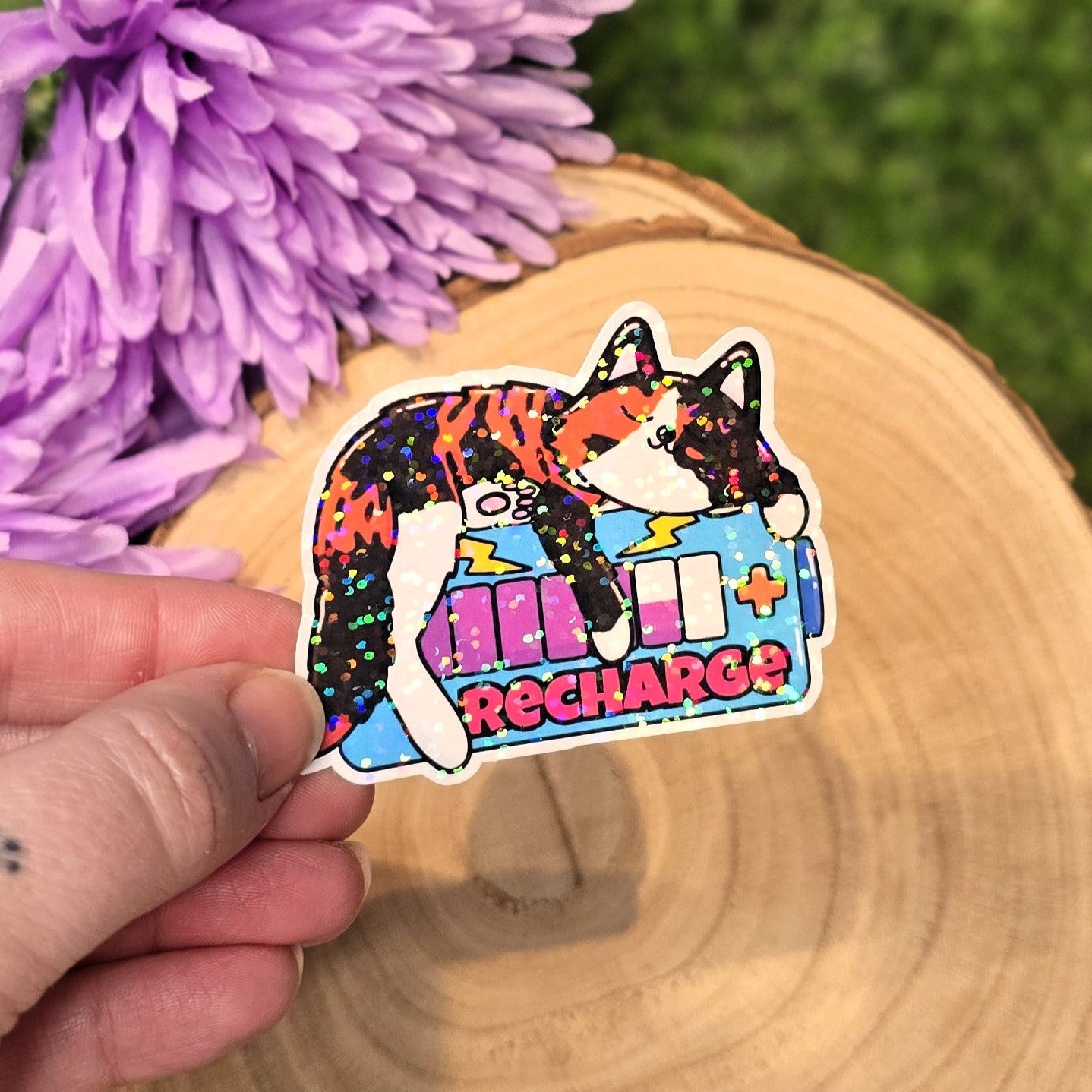 Holographic Recharge cat sticker with low battery icon