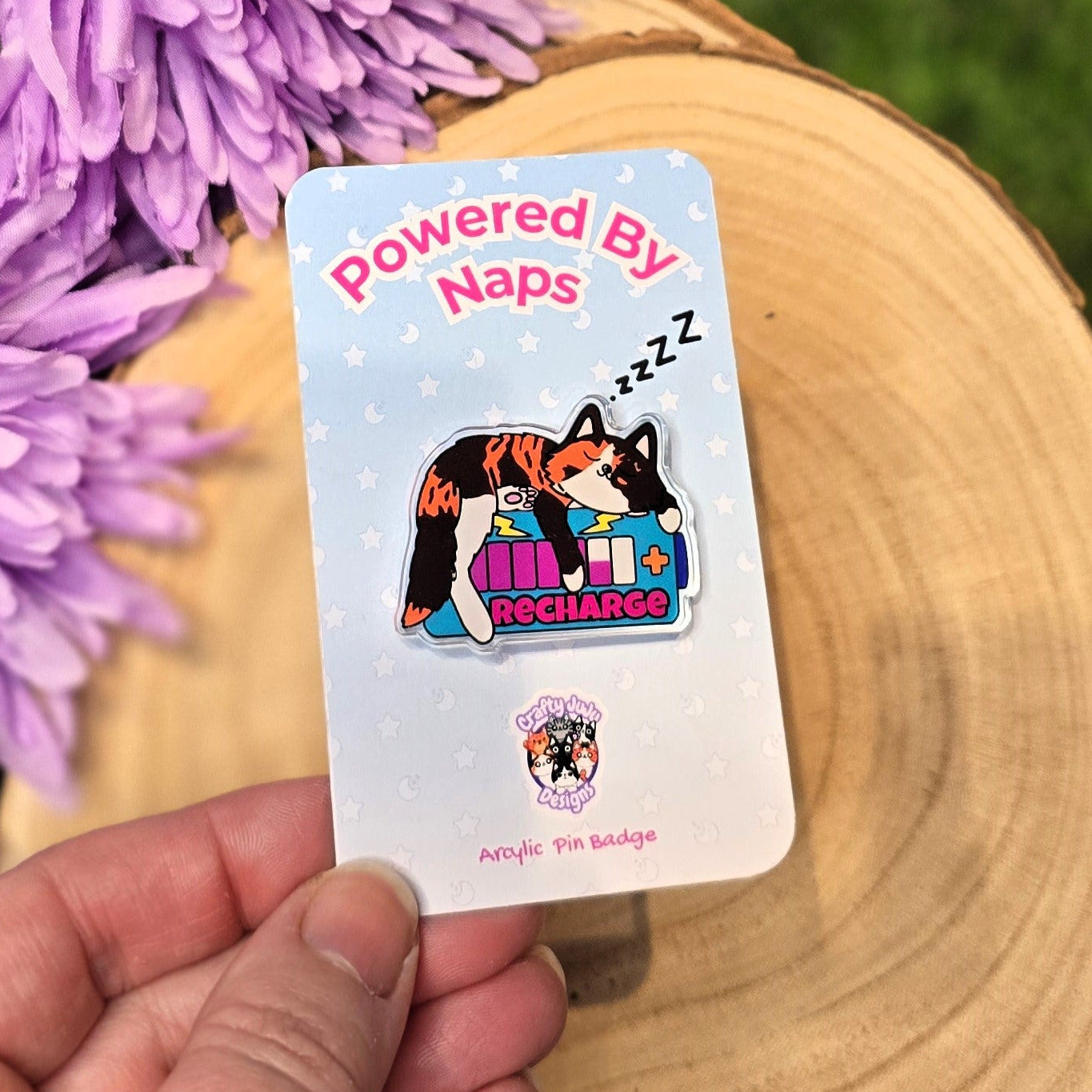 Powered By Naps acrylic pin badge with recharge cat design