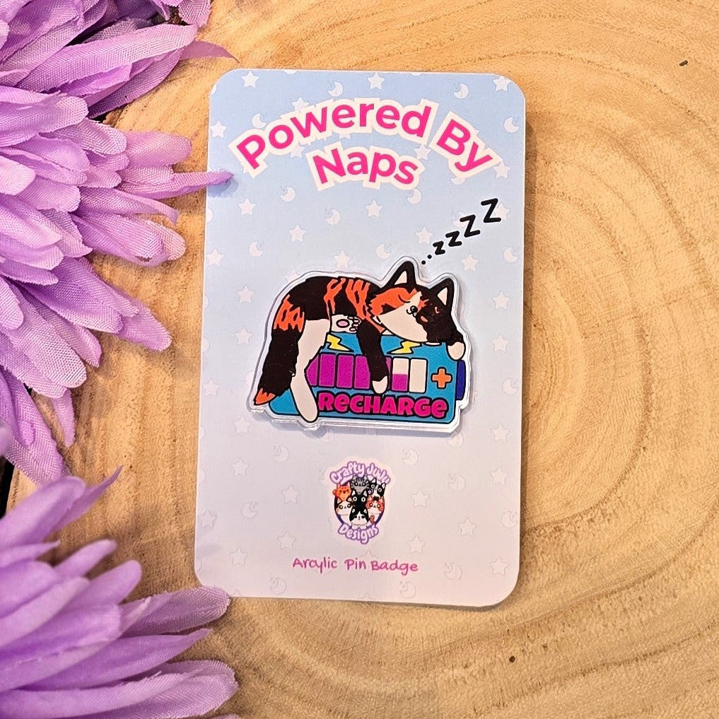 Powered By Naps acrylic pin badge with recharge cat design