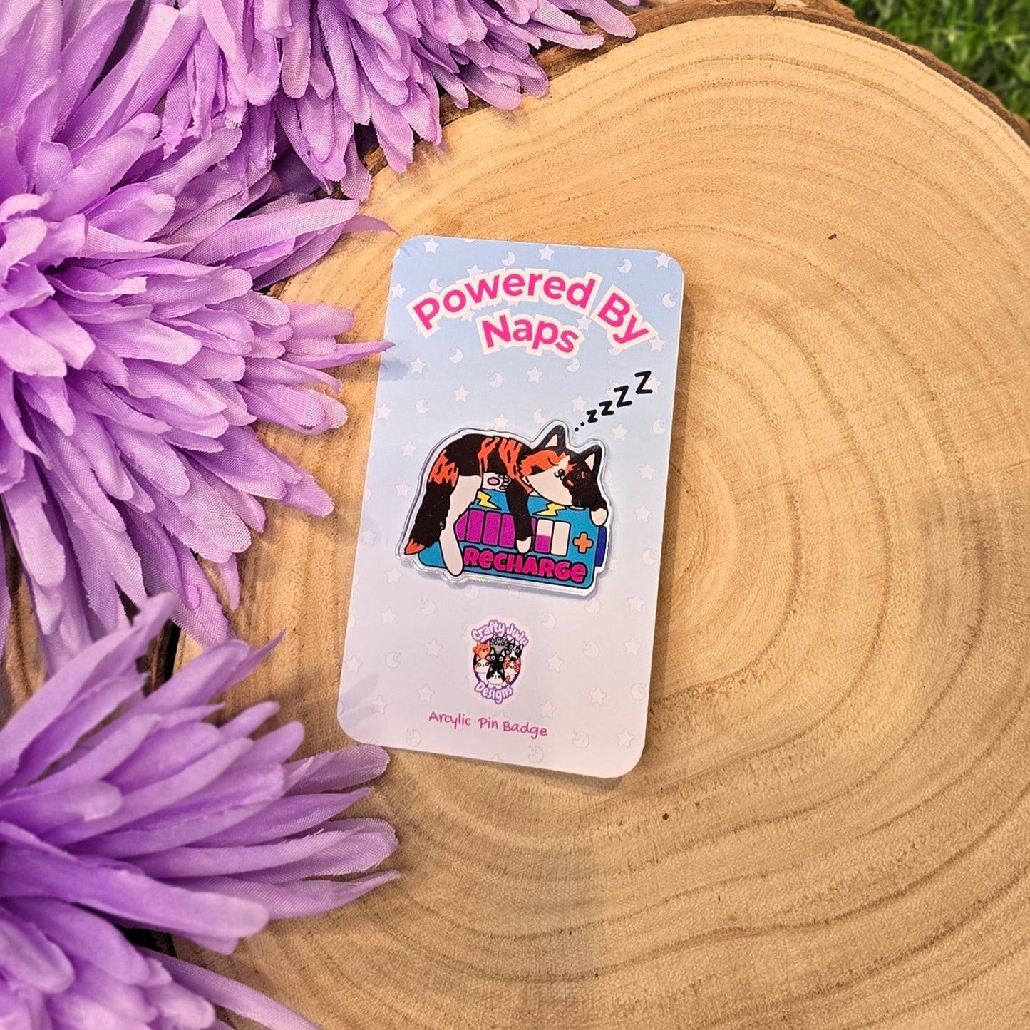 Powered By Naps acrylic pin badge with recharge cat design