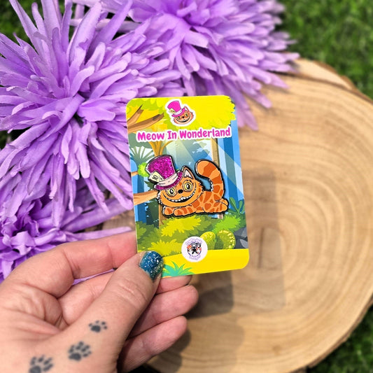 Cheshire cat enamel pin with purple glitter hat