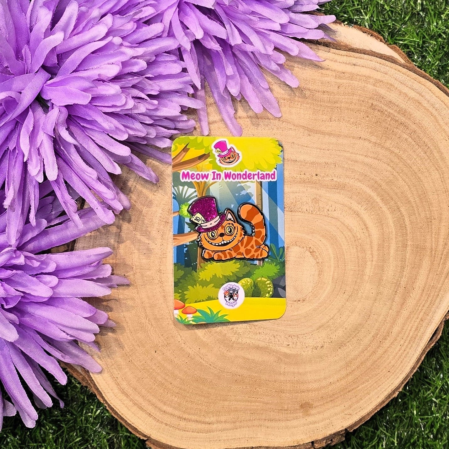 Cheshire cat enamel pin with purple glitter hat