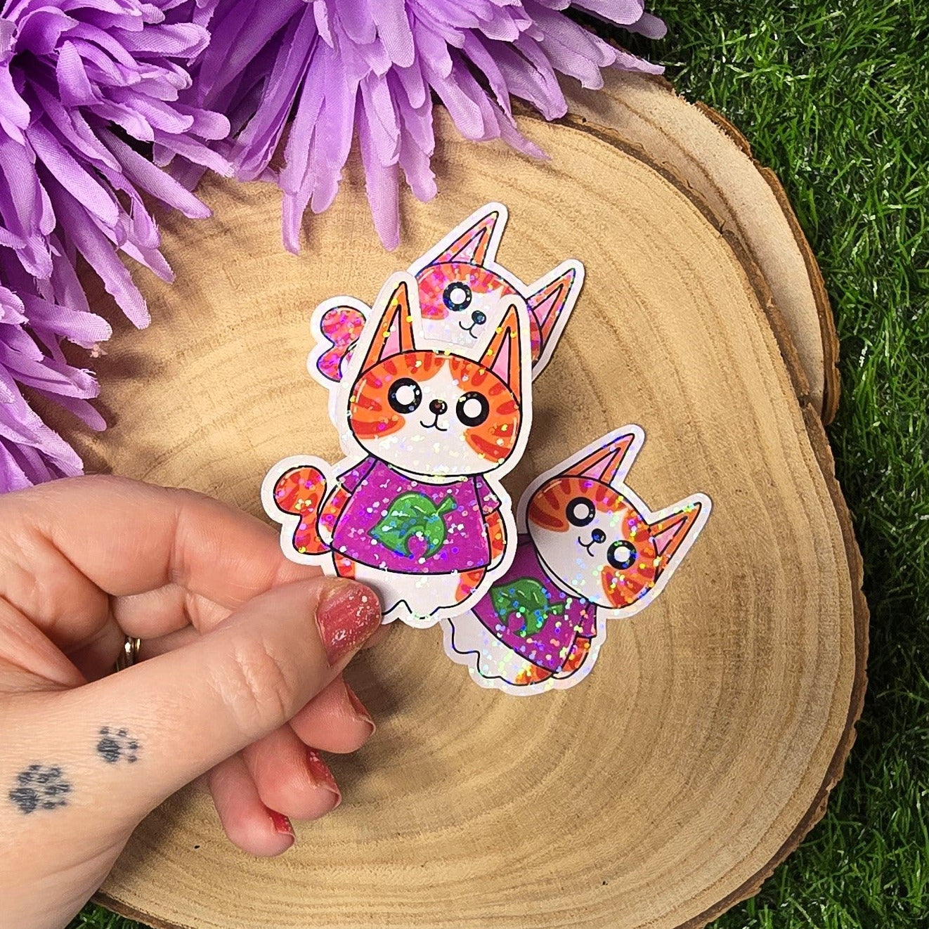 Cosy village Tony cat vinyl sticker wearing a leaf shirt, life sim inspired die cut waterproof handmade sticker 6.5cm UK