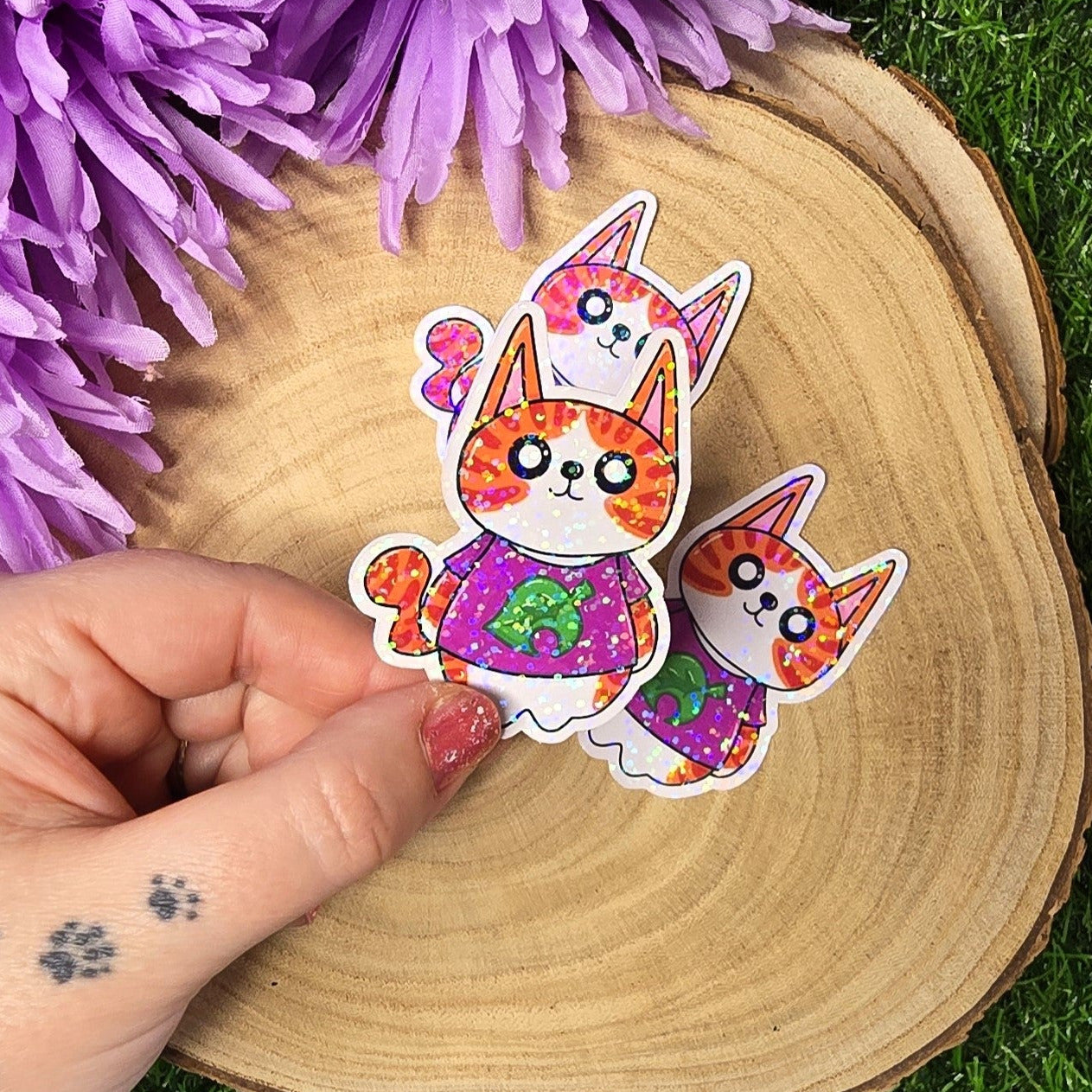 Cosy village Tony cat vinyl sticker wearing a leaf shirt, life sim inspired die cut waterproof handmade sticker 6.5cm UK