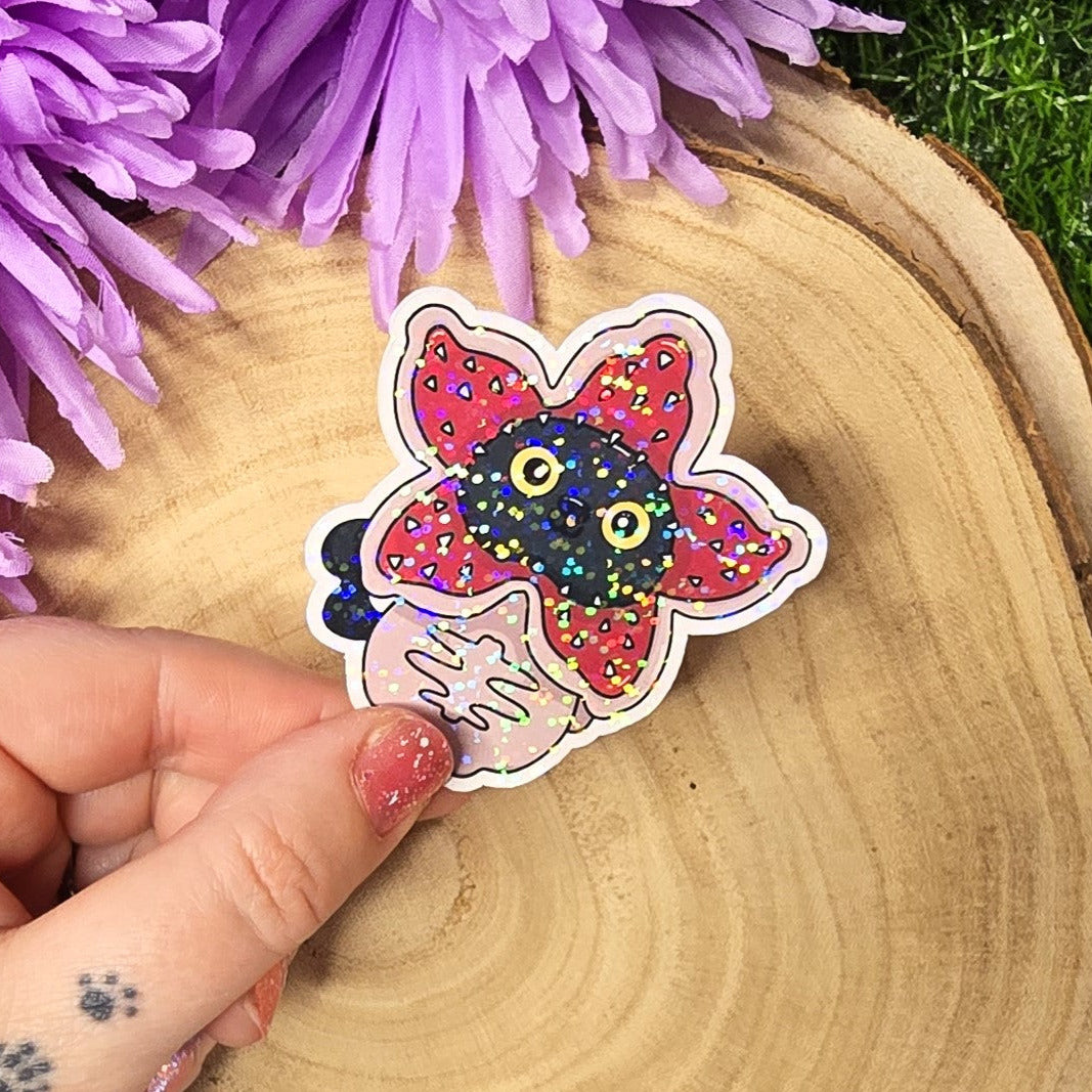 Holographic Luna black cat dressed as spooky flower monster, 80s horror inspired die cut waterproof sticker 7cm UK