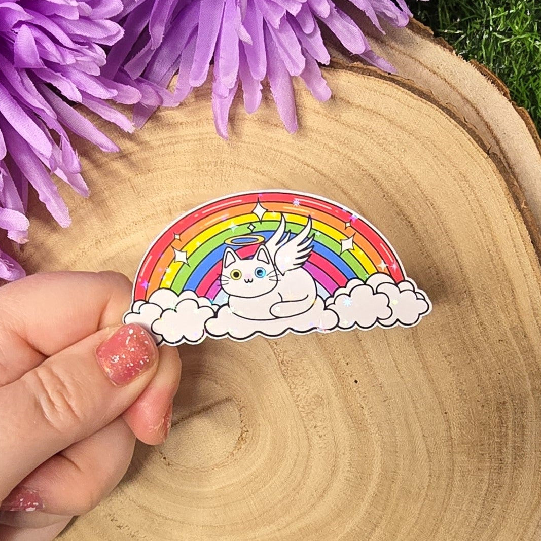 Holographic angel cat vinyl sticker resting on clouds under rainbow, memorial pet rainbow bridge design 8cm UK handmade
