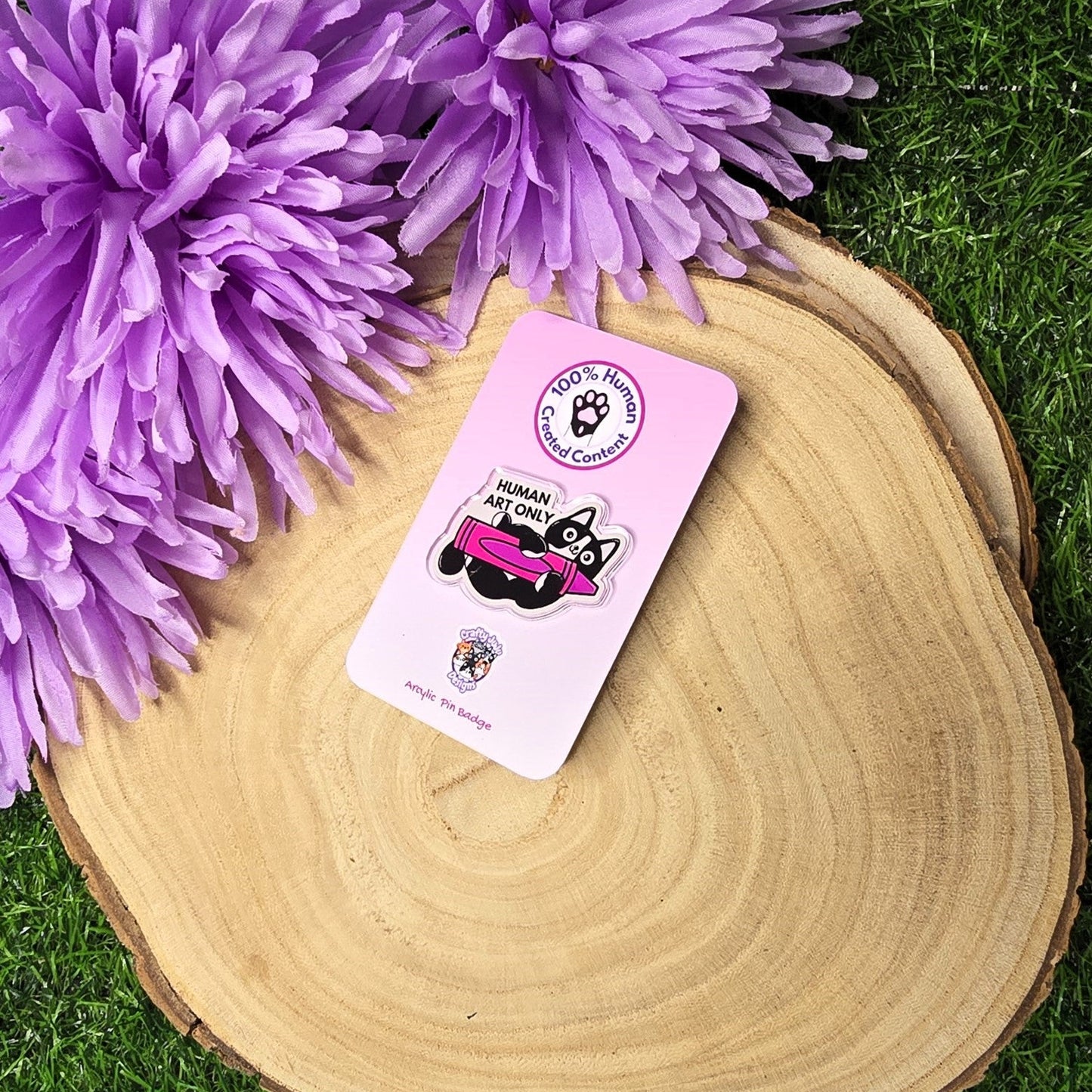 Human art only acrylic pin badge showing black and white cat holding pink crayon, artist humour accessory 4cm UK