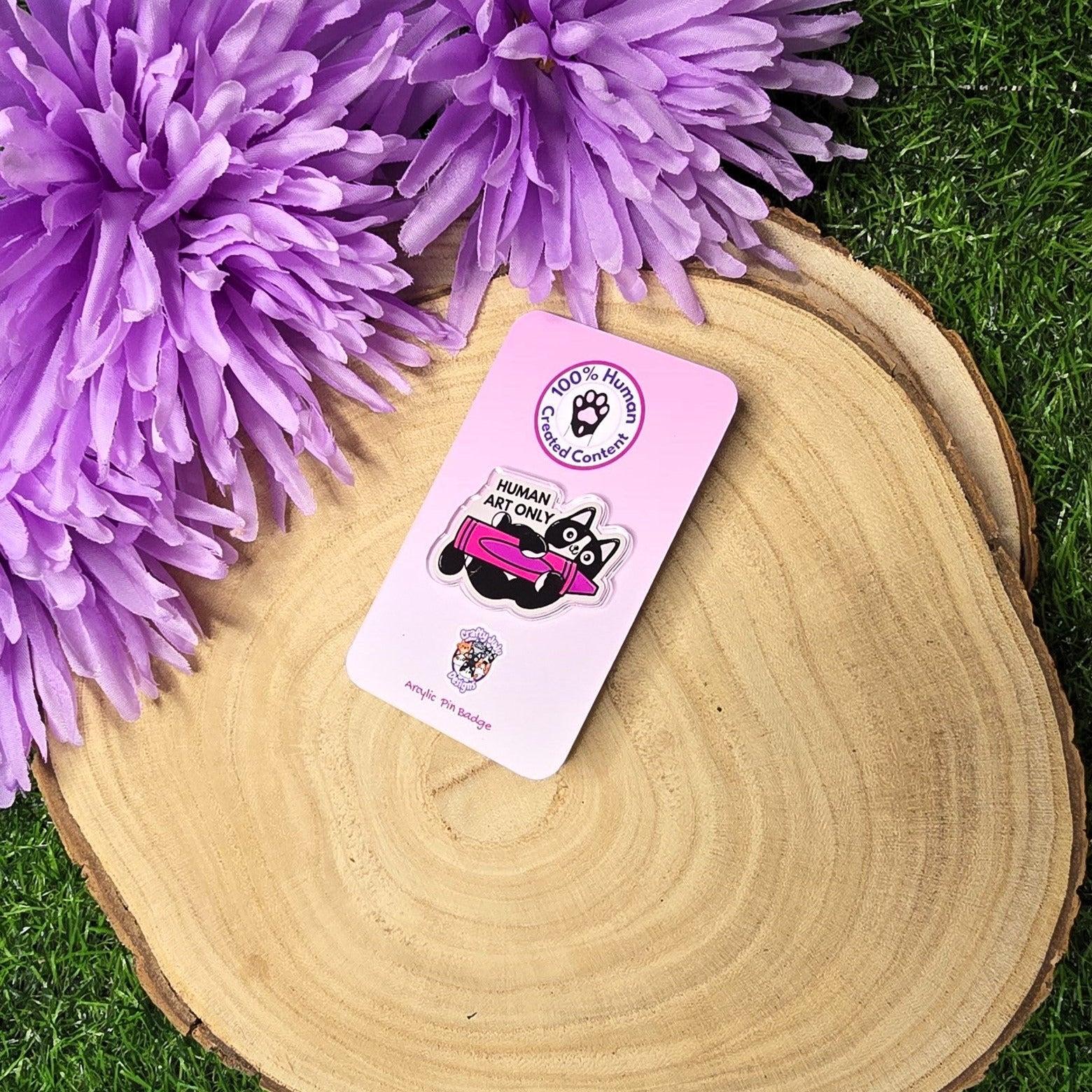 Human art only acrylic pin badge showing black and white cat holding pink crayon, artist humour accessory 4cm UK