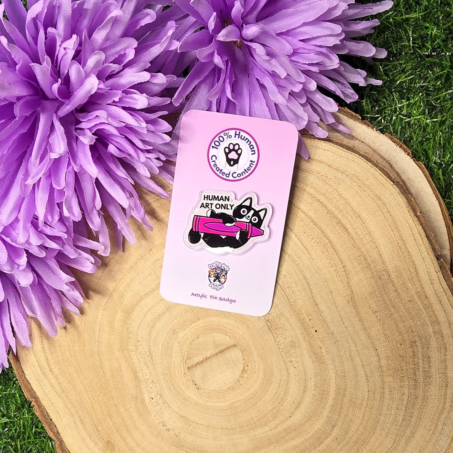 Human art only acrylic pin badge showing black and white cat holding pink crayon, artist humour accessory 4cm UK