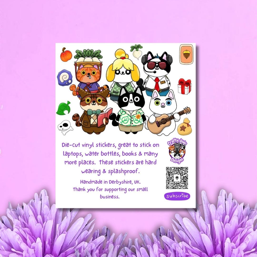 A sheet of die-cut vinyl stickers featuring cute animal characters on a white backing card, set against a pink background with purple flowers at the bottom. The stickers include various cartoon animals in colorful outfits and accessories.