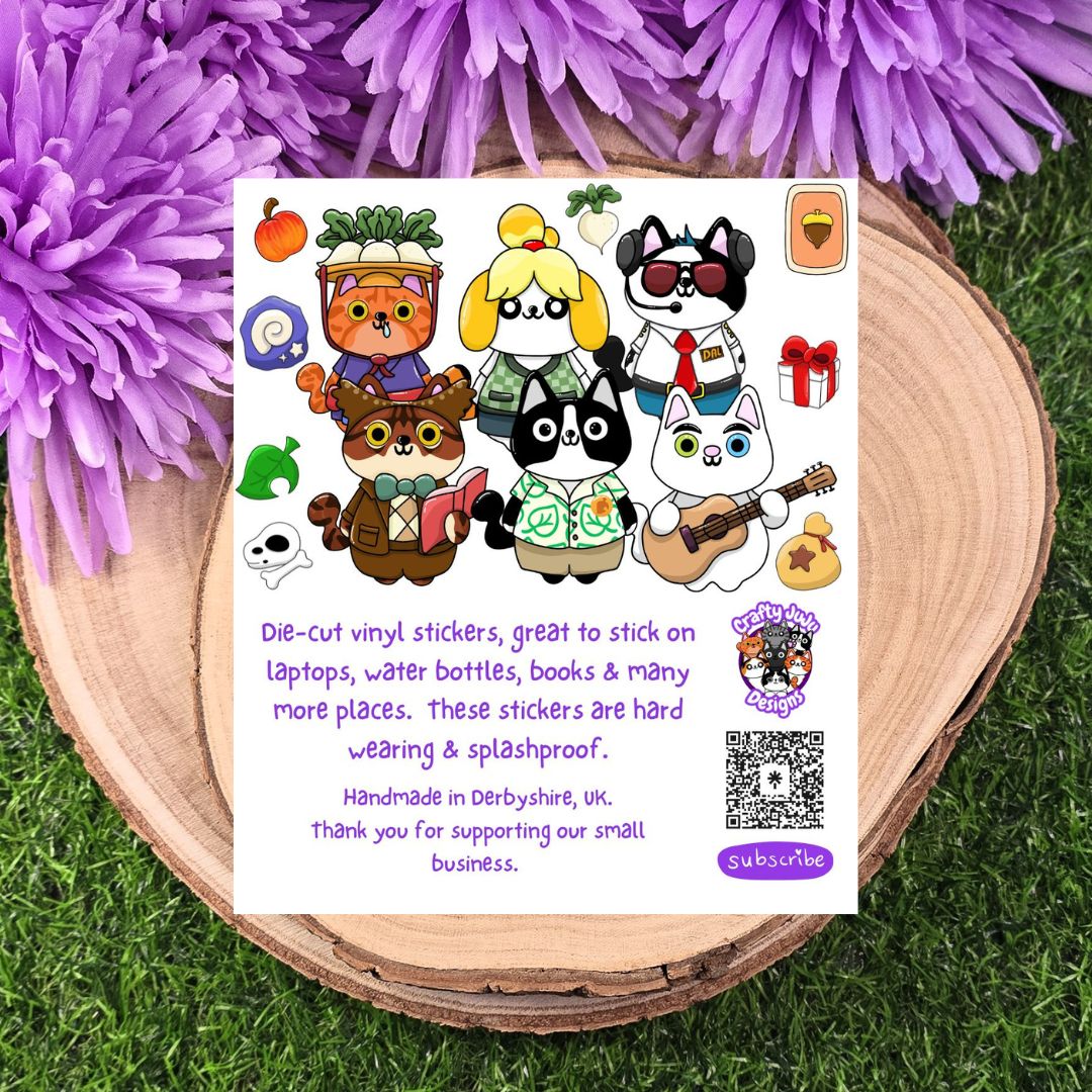 Card with cartoon animal characters on a wooden surface with purple flowers