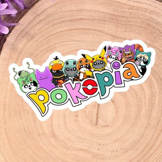 Pokémon-themed sticker on a wooden slice with purple flowers