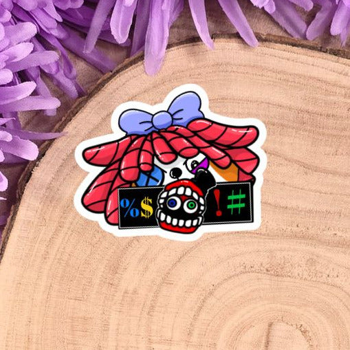 Sticker with colorful design on a wooden log with purple flowers