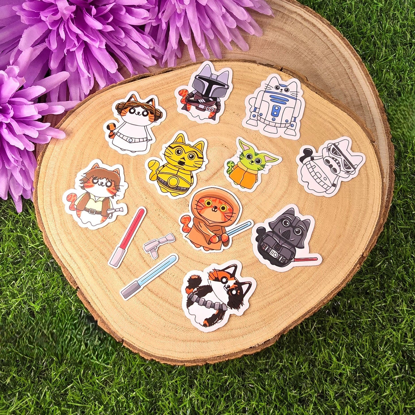 Set of colorful animal stickers on a wooden disc with purple flowers in the background