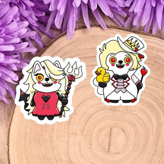 Two cartoon character stickers on a wooden disc with purple flowers in the background