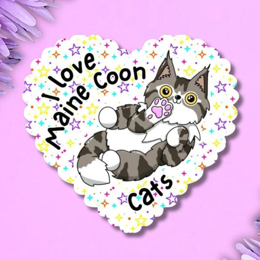 A heart-shaped sticker featuring a Maine Coon cat with the text 'I love Maine Coon Cats' on a purple background with purple flowers in the corners.