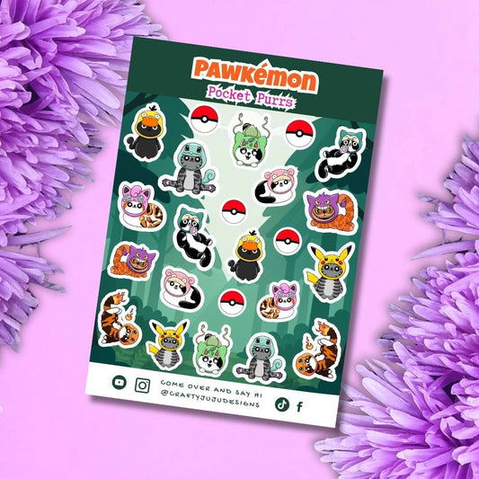 A sheet of Pawkmón Pocket Pets stickers displayed on a pink background with purple flowers. The sticker sheet features various cute pet characters and Pokémon Pokéballs, with the brand name 'PAWkómon' prominently displayed at the top.